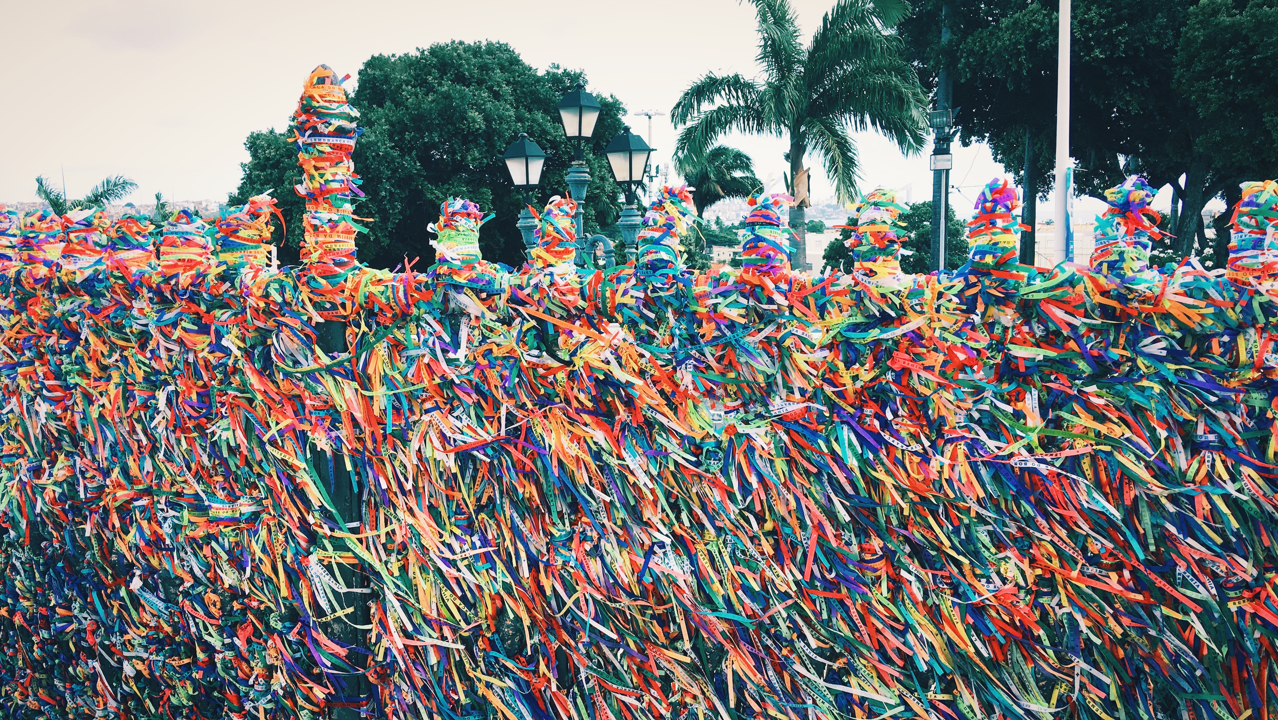 Senhor do Bonfim, Salvador Brazil - Image of fence covered in colourful ribbons