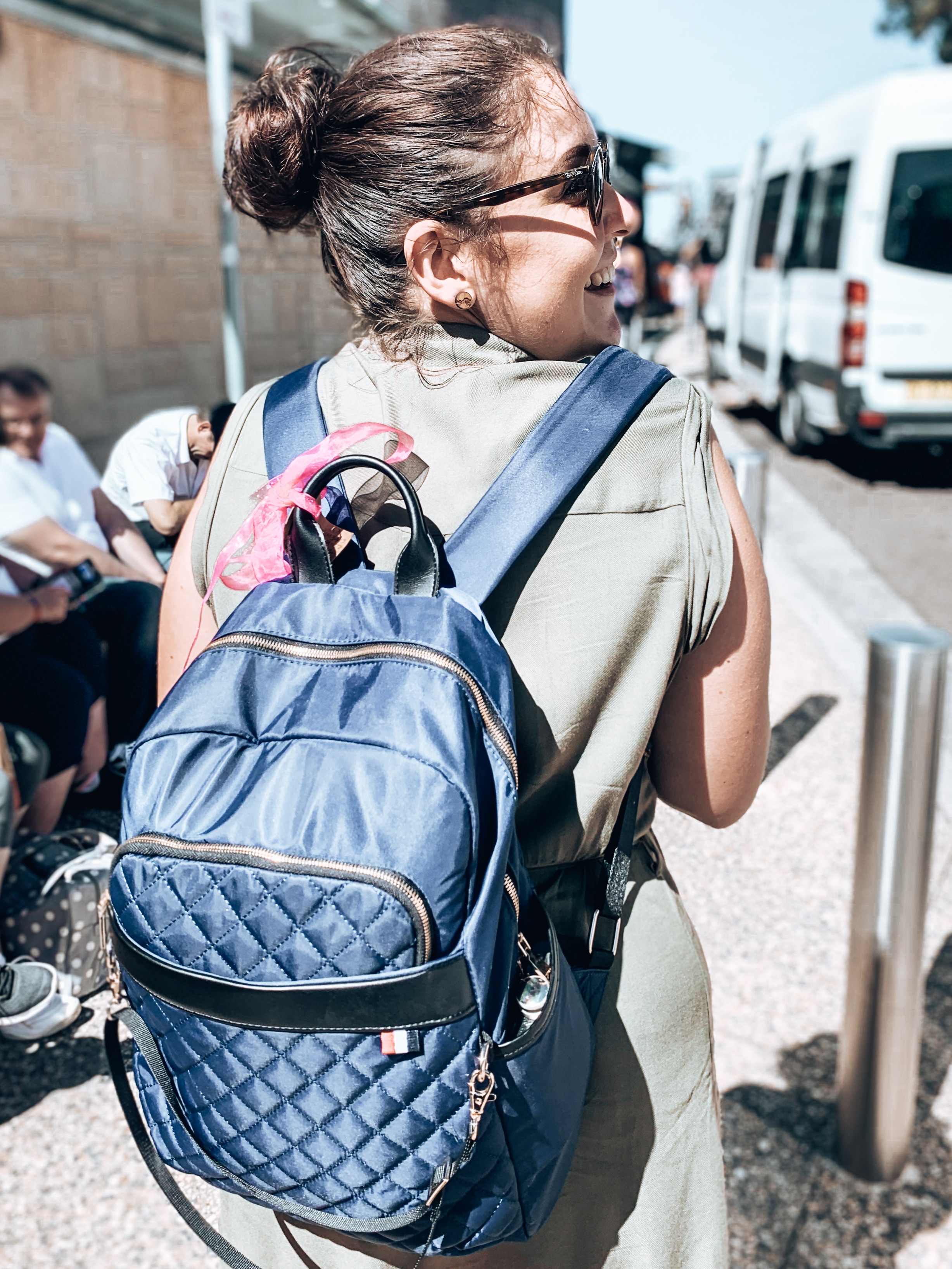 Lady with navy day backpack on her back