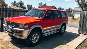 88 days of farm work - Image of red 4x4 car