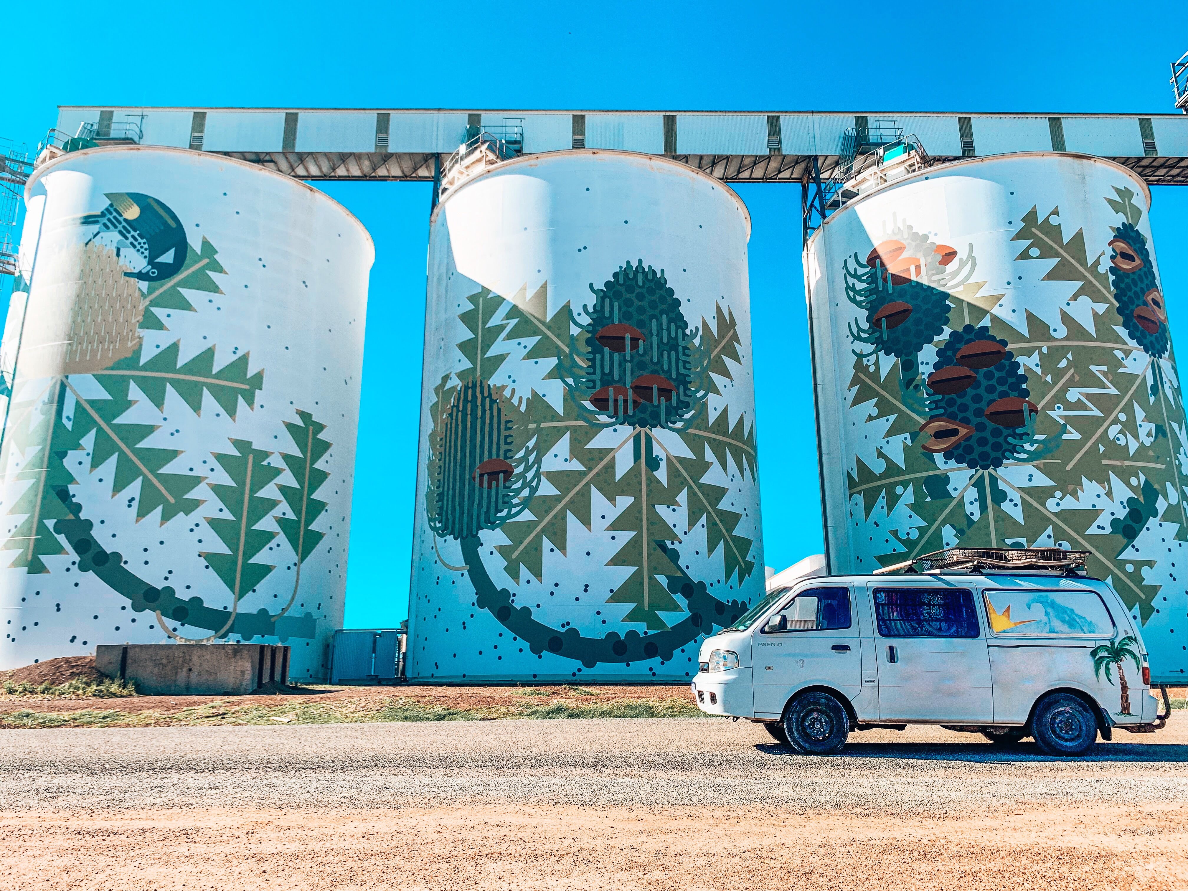 Silo Art with camper van parked in front