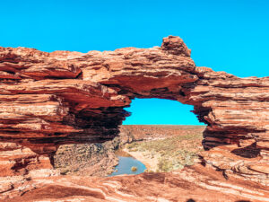 Natures window - Kalbarri National Park. A stone formed with a large hole, representing a window overlooking a gorge below.