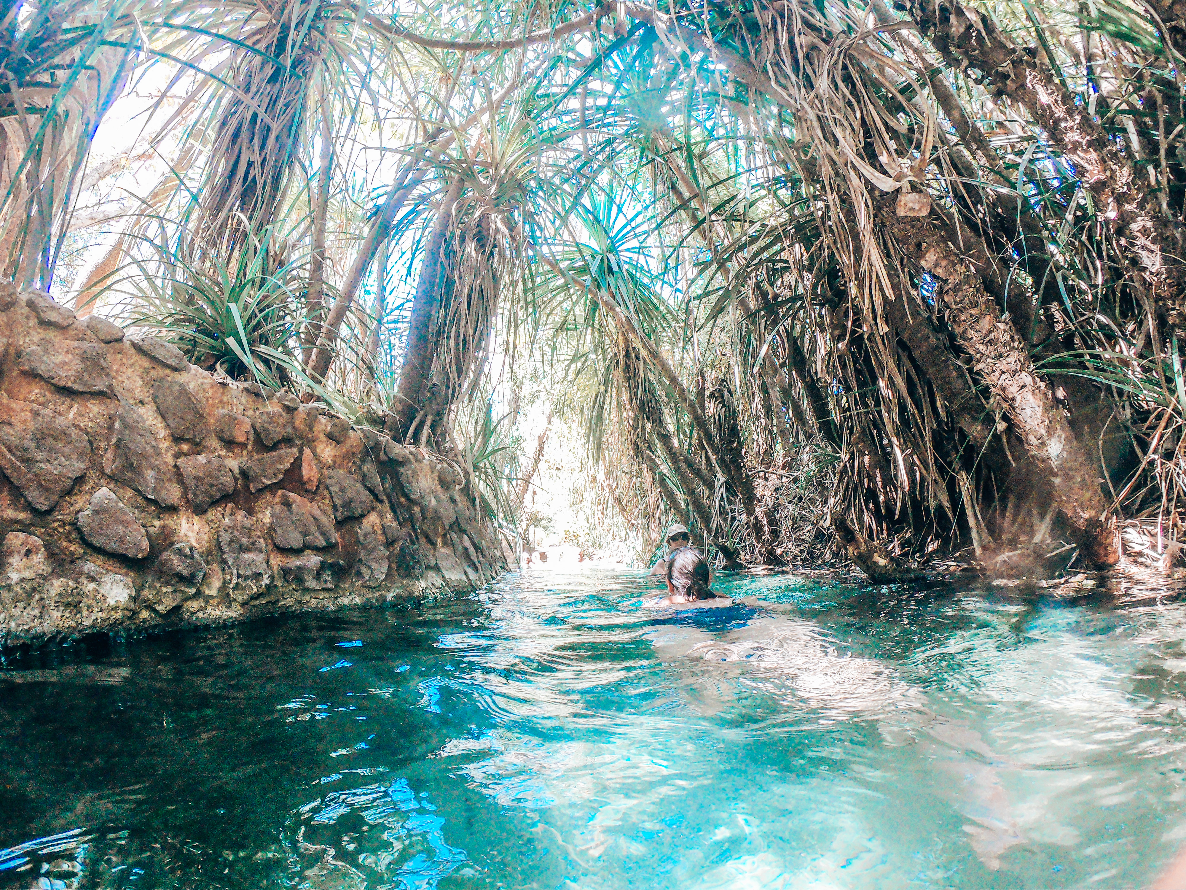 Katherine Spring - Person swimming through natural springs