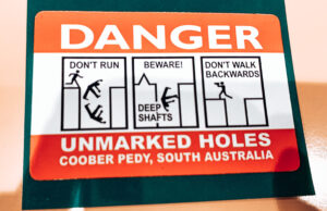 Coober Pedy - Danger Sign warning of unmarked holes