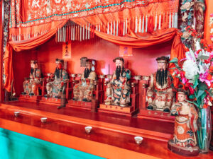 Darwin Chinese Temple - Chinese figurines in a temple display