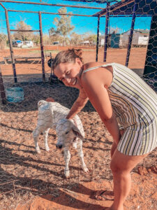 Banka Banka Station - Sarah stroking a baby calf