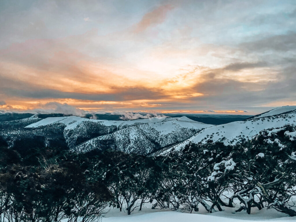 Image of snow topped mountains at sunset - Melbourne to Mount Hotham